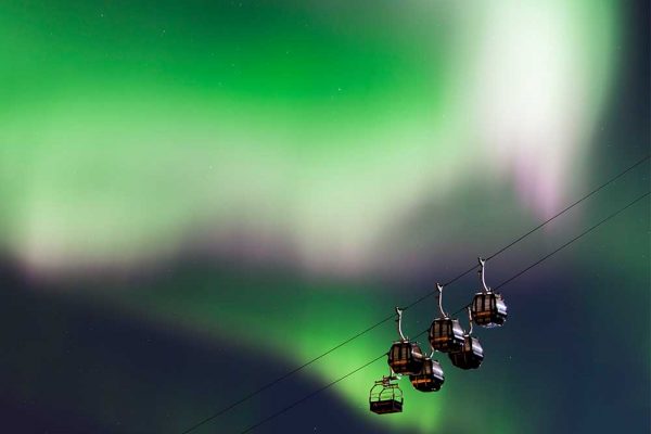 gondola lift and northern lights